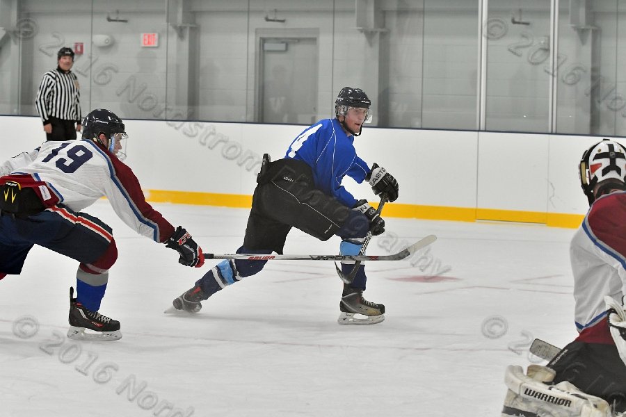 Wheaton College Men\'s Ice Hockey vs Middlesex Community College. - Photo By: KEITH NORDSTROM